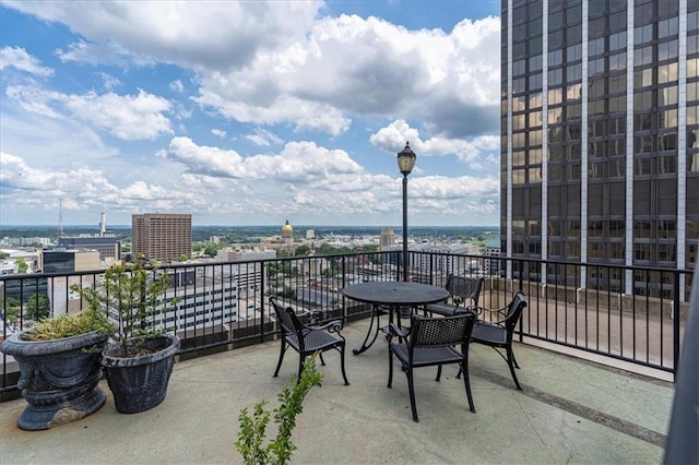 view of patio with a balcony