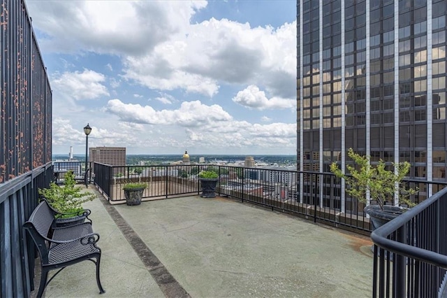 view of patio / terrace featuring a balcony