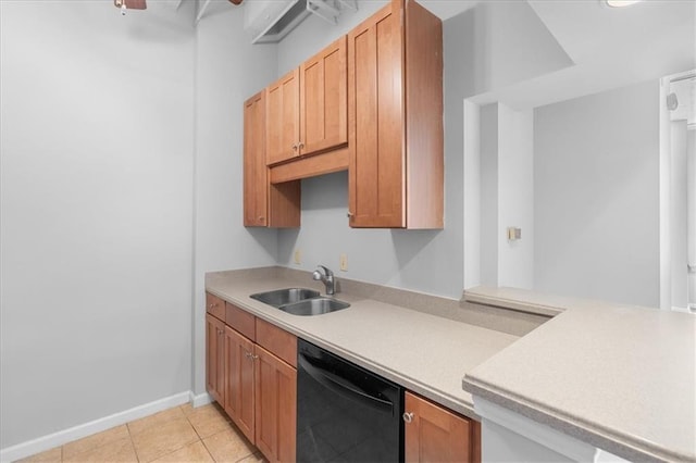 kitchen with black dishwasher, sink, and light tile patterned floors