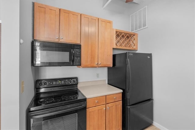 kitchen featuring black appliances