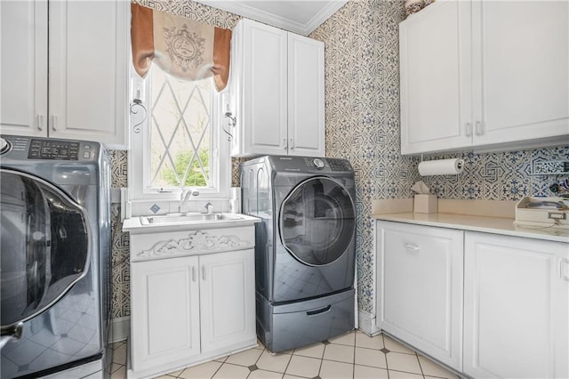 1500 Historic Vw, Stone Mountain, GA 30087 - laundry area featuring cabinet space, crown molding, wallpapered walls, light tile patterned flooring, and washer and dryer