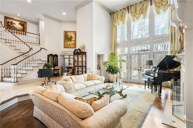 1500 Historic Vw, Stone Mountain, GA 30087 - living area with stairs, french doors, crown molding, a towering ceiling, and wood finished floors