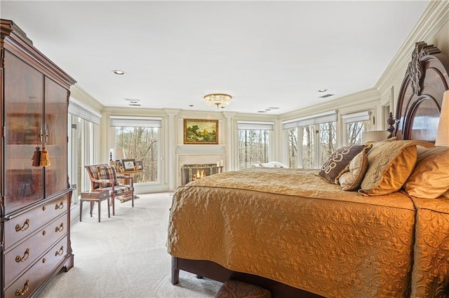 1500 Historic Vw, Stone Mountain, GA 30087 - bedroom featuring light colored carpet, access to exterior, ornamental molding, and a warm lit fireplace