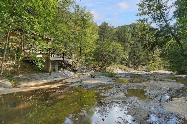 1500 Historic Vw, Stone Mountain, GA 30087 - view of yard featuring a view of trees, a deck, and stairs