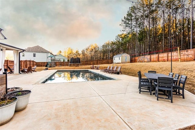 view of pool with a patio area and a fenced backyard