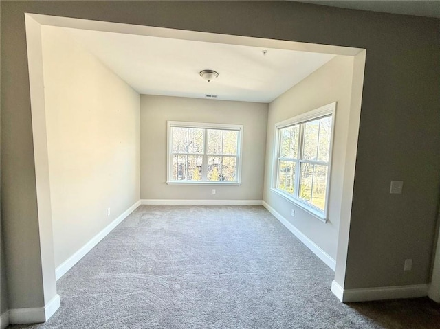 view of carpeted spare room