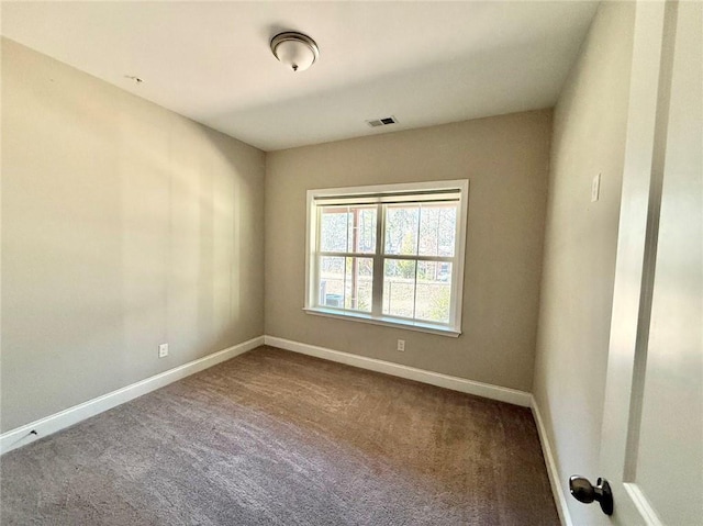 view of carpeted spare room