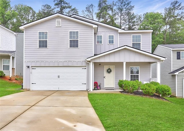 336 Freeman Cir, Villa Rica, GA 30180 - traditional-style house with board and batten siding, concrete driveway, a front lawn, and a garage