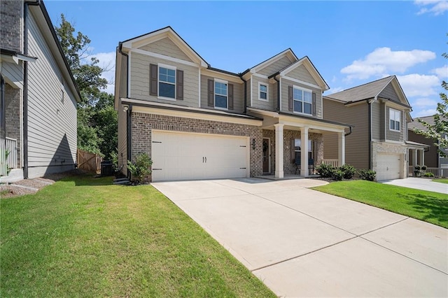 view of front of property with a garage and a front yard