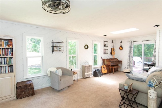 510 Whistlestop Dr, Woodstock, GA 30189 - living area with healthy amount of natural light, carpet, and wooden walls