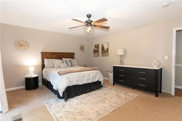 510 Whistlestop Dr, Woodstock, GA 30189 - bedroom with light colored carpet, baseboards, and ceiling fan