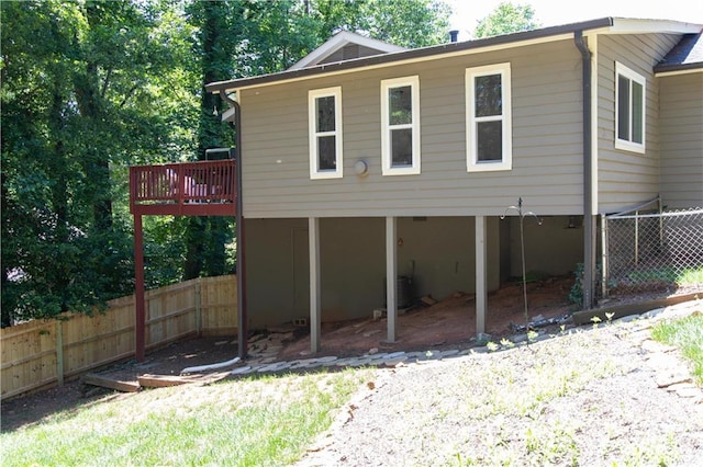 510 Whistlestop Dr, Woodstock, GA 30189 - view of home's exterior featuring a wooden deck and cooling unit