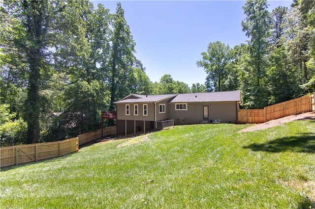 510 Whistlestop Dr, Woodstock, GA 30189 - back of property featuring a deck and view of wooded area