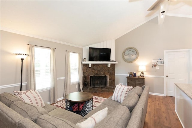 510 Whistlestop Dr, Woodstock, GA 30189 - living area featuring wood finished floors, a stone fireplace, ceiling fan, baseboards, and ornamental molding