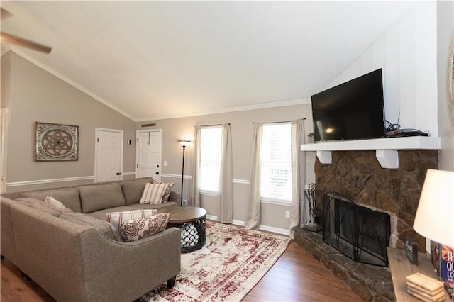 510 Whistlestop Dr, Woodstock, GA 30189 - living room with wood finished floors, vaulted ceiling, ceiling fan, a fireplace, and baseboards