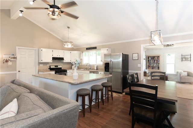 510 Whistlestop Dr, Woodstock, GA 30189 - kitchen featuring stainless steel appliances, open floor plan, light countertops, white cabinetry, and a sink