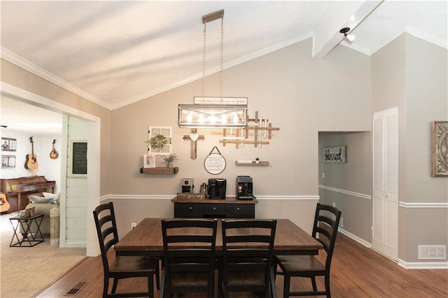 510 Whistlestop Dr, Woodstock, GA 30189 - dining area with wood finished floors, lofted ceiling, and ornamental molding
