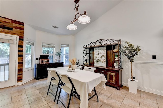 2220 Lily Valley Dr, Lawrenceville, GA 30045 - dining area featuring light tile patterned floors and high vaulted ceiling