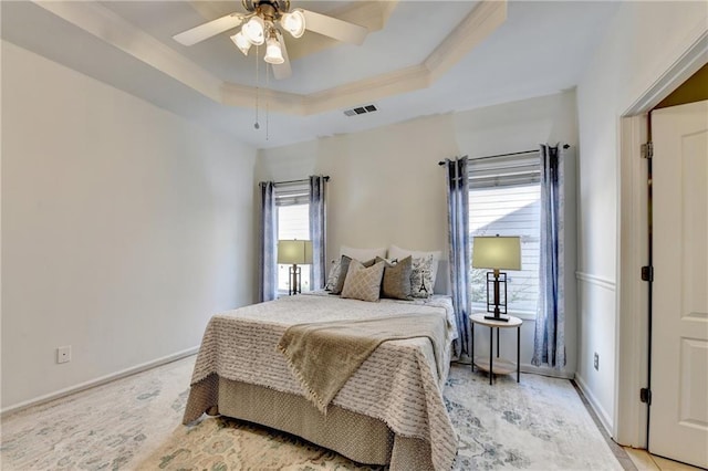 2220 Lily Valley Dr, Lawrenceville, GA 30045 - bedroom with a tray ceiling, a ceiling fan, and crown molding