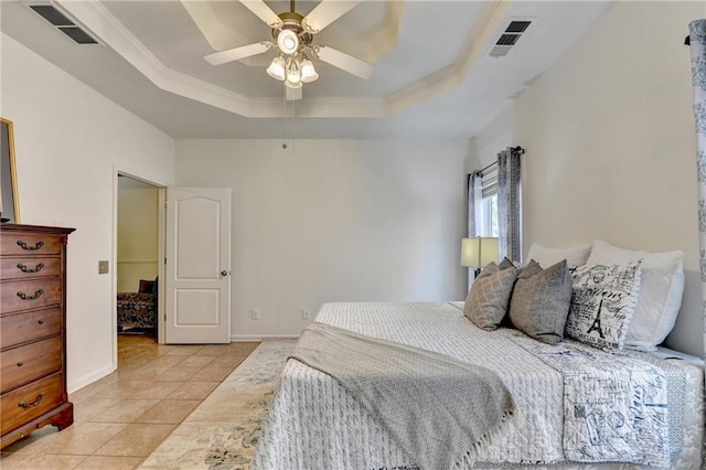 2220 Lily Valley Dr, Lawrenceville, GA 30045 - bedroom featuring a tray ceiling, light tile patterned floors, crown molding, and a ceiling fan