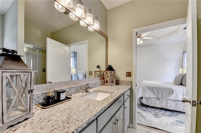 2220 Lily Valley Dr, Lawrenceville, GA 30045 - bathroom with ensuite bath, vanity, and ceiling fan