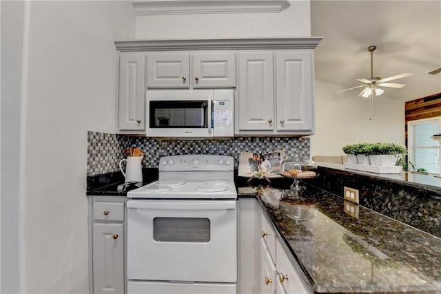 2220 Lily Valley Dr, Lawrenceville, GA 30045 - kitchen featuring white range with electric stovetop, backsplash, ceiling fan, and dark stone countertops
