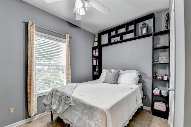 2220 Lily Valley Dr, Lawrenceville, GA 30045 - bedroom with baseboards and ceiling fan
