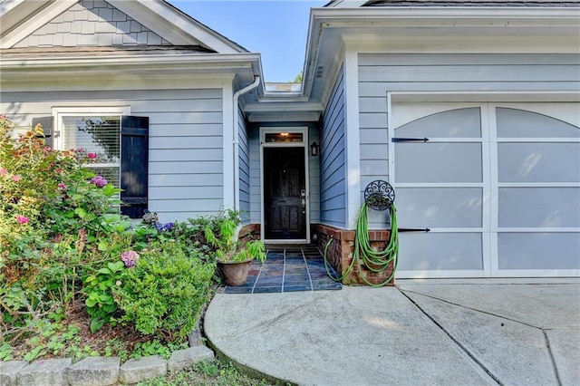 2220 Lily Valley Dr, Lawrenceville, GA 30045 - view of exterior entry with a garage
