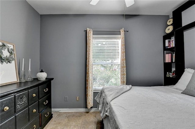 2220 Lily Valley Dr, Lawrenceville, GA 30045 - bedroom featuring baseboards and a ceiling fan