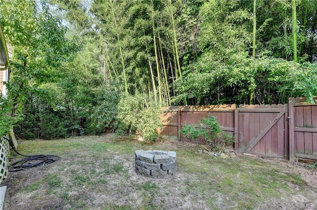 2220 Lily Valley Dr, Lawrenceville, GA 30045 - view of yard featuring a fire pit