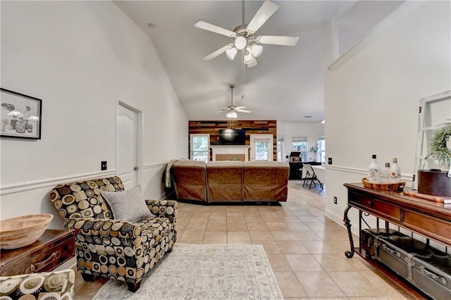2220 Lily Valley Dr, Lawrenceville, GA 30045 - living area with high vaulted ceiling, a ceiling fan, and light tile patterned floors