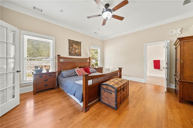 bedroom with ceiling fan, ornamental molding, and light wood-type flooring