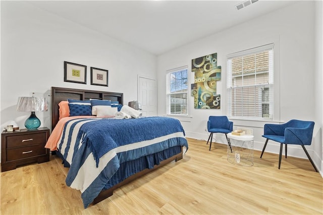 1463 Metropolitan Pkwy SW, Atlanta, GA 30310 - bedroom with light wood-type flooring, baseboards, and a closet