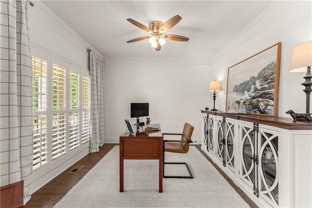 office with a ceiling fan, ornamental molding, and wood finished floors