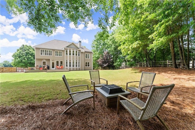 view of yard with a fire pit
