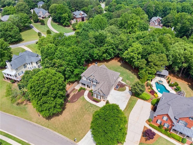 aerial perspective of suburban area with a pool