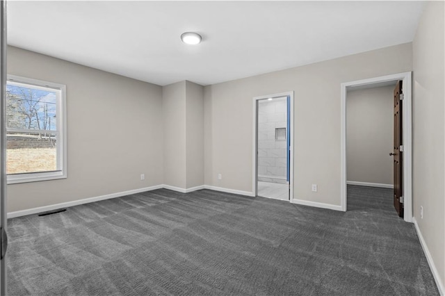 4064 Post Rd, Winston, GA 30187 - unfurnished bedroom with dark colored carpet and connected bathroom