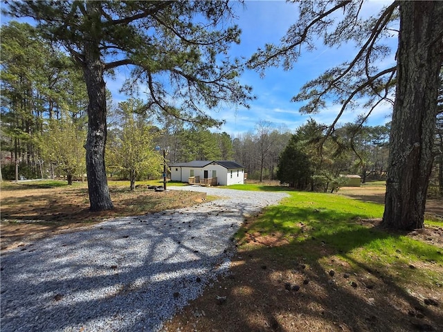 4064 Post Rd, Winston, GA 30187 - view of front of house featuring gravel driveway and a front lawn