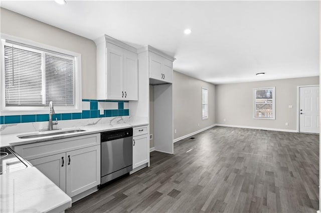 4064 Post Rd, Winston, GA 30187 - kitchen featuring dishwasher, white cabinetry, wood finished floors, light stone countertops, and recessed lighting