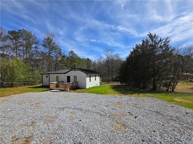 4064 Post Rd, Winston, GA 30187 - exterior space with a lawn, gravel driveway, and a deck