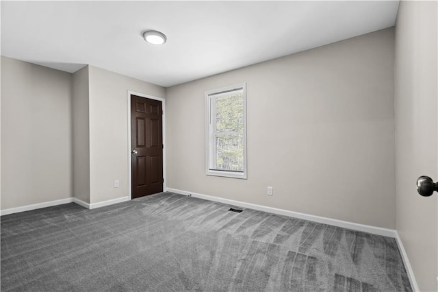 4064 Post Rd, Winston, GA 30187 - empty room with baseboards and dark carpet