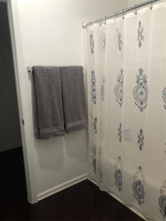 bathroom featuring walk in shower