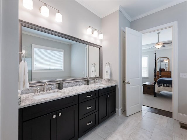 bathroom featuring vanity, ornamental molding, and ceiling fan