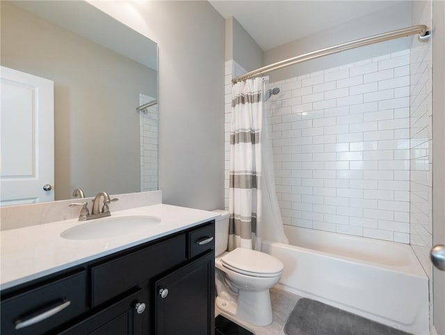 full bathroom with vanity, toilet, and shower / bath combo with shower curtain