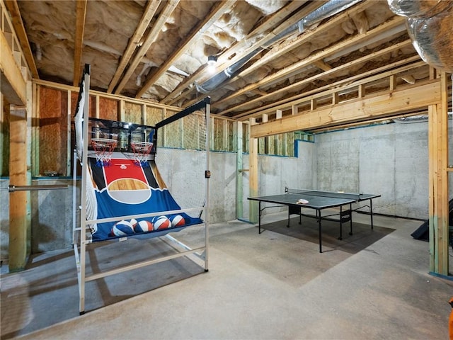 playroom featuring concrete flooring