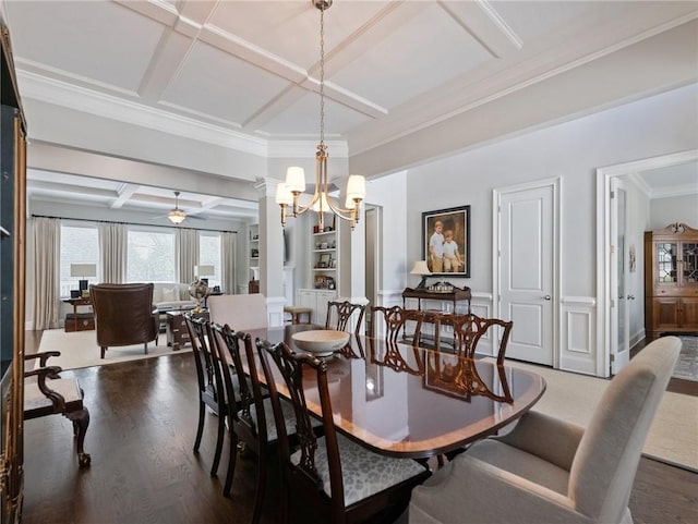 dining space featuring crown molding, dark hardwood / wood-style floors, coffered ceiling, beamed ceiling, and ornate columns