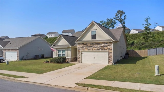 view of front of property with a garage and a front lawn