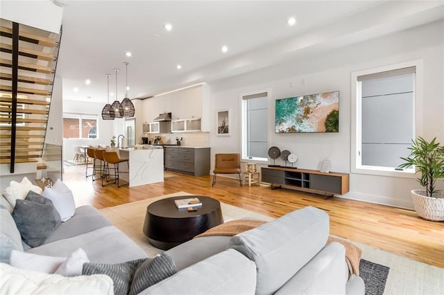 167 Sampson St NE, Atlanta, GA 30312 - living area featuring light wood finished floors and recessed lighting