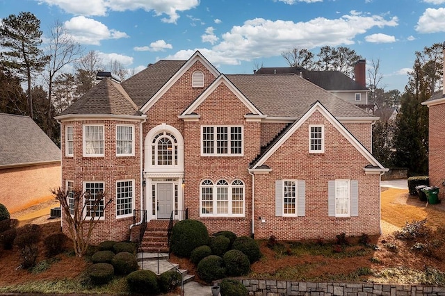 view of front of house with central AC unit