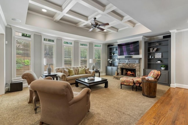 4250 Old Oak Trce, Cumming, GA 30041 - living room featuring healthy amount of natural light, ceiling fan, a fireplace, ornamental molding, and coffered ceiling